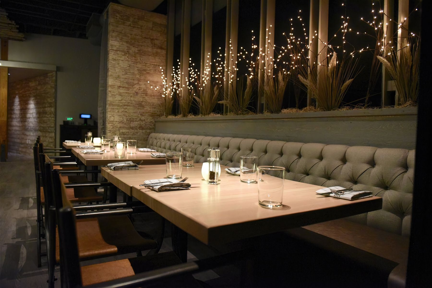 A warm, glowing restaurant interior at night