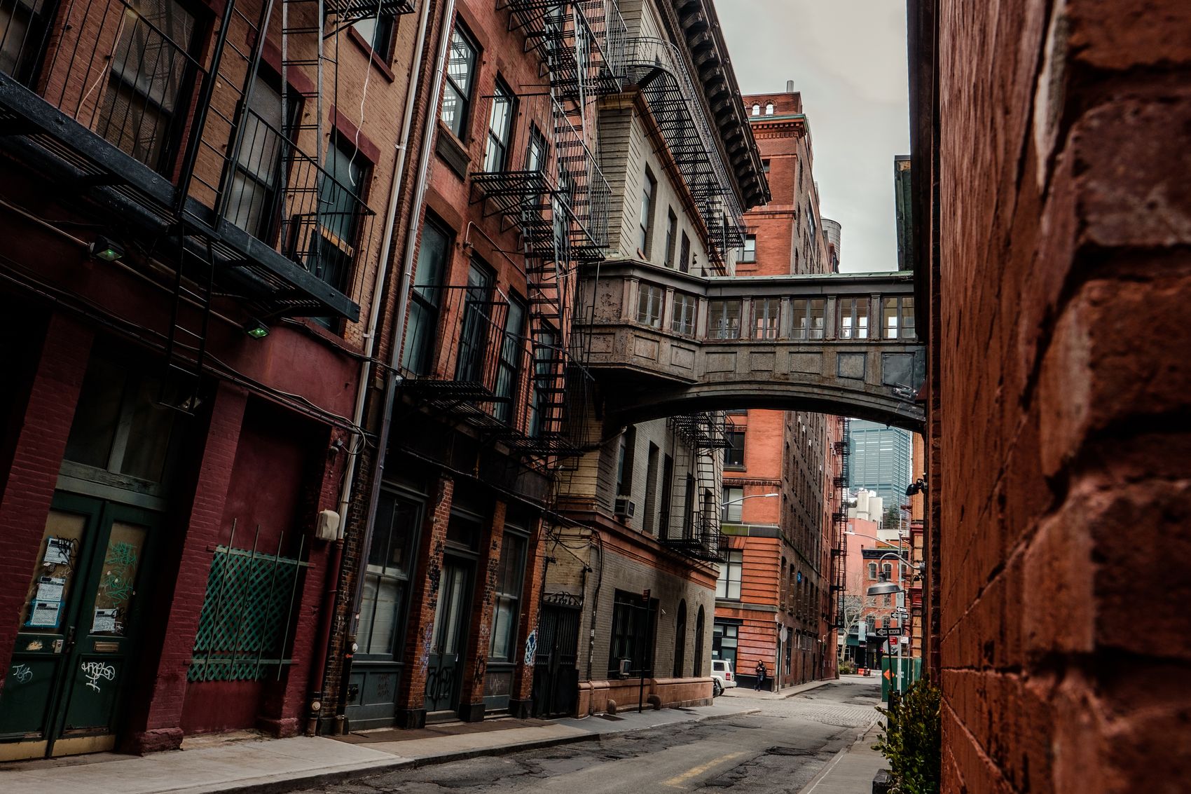A cast-iron skybridge between brick buildings in Tribeca, New York